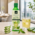 Tropical aloe vera and green tea iced tea 500 ml bottle with iced glass and fresh aloe